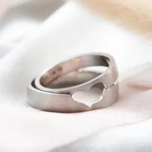 Gold heart cut out wedding bands LOVE