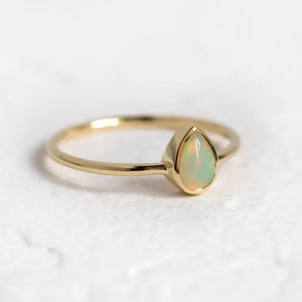 Pear white opal ring in solid gold FINN Image