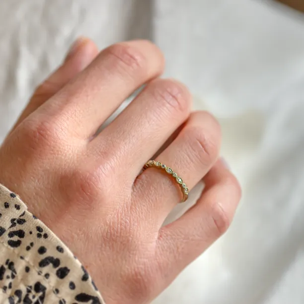 Zlaté snubní prsteny s diamanty LATI Image