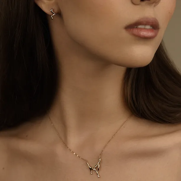 Minimalistické zlaté náušnice vlnky MIGNON Image