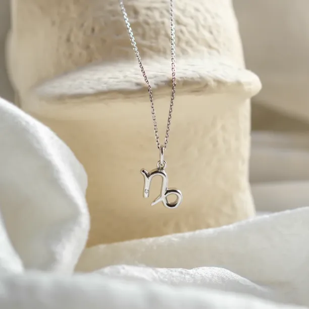 Zlatý přívěsek s diamantem KOZOROH Image