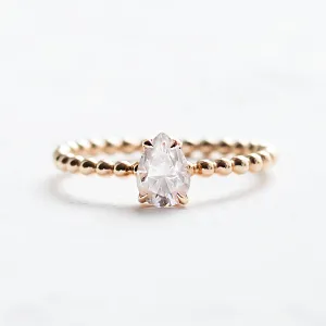 Gold engagement ring with beaded ball setting and pear moissanite BEAU