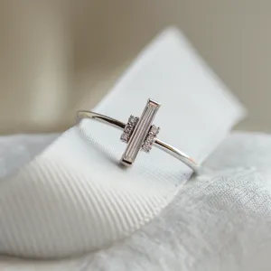 An unconventional engagement ring with a central baguette moissanite ETHEL Thumbnail