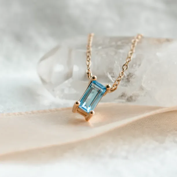 Gold necklace with a baguette cut topaz LUCERNE Image