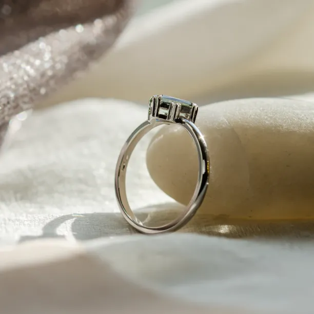 Gold ring with radiant teal sapphire and side diamonds JOY Image