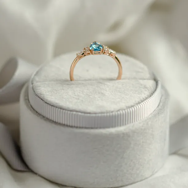 Gold ring with topaz and moissanites ASTROS Image