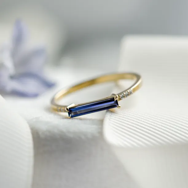 Gold ring with blue lab grown sapphire and diamonds IRIS Image