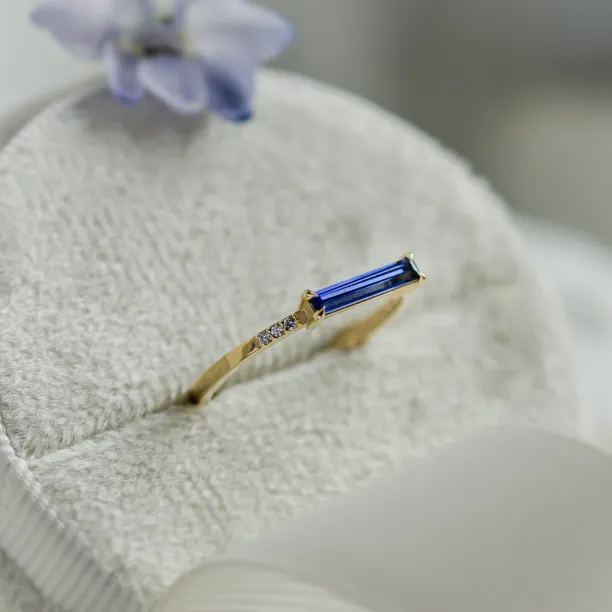 Gold ring with blue lab grown sapphire and diamonds IRIS Image