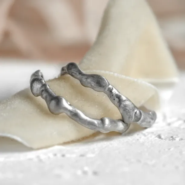 Curved gold wedding rings ZINC Image