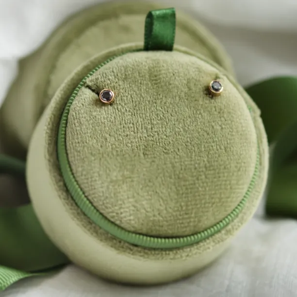 Minimalist gold earrings with salt and pepper diamonds in bezel setting NOLA Image