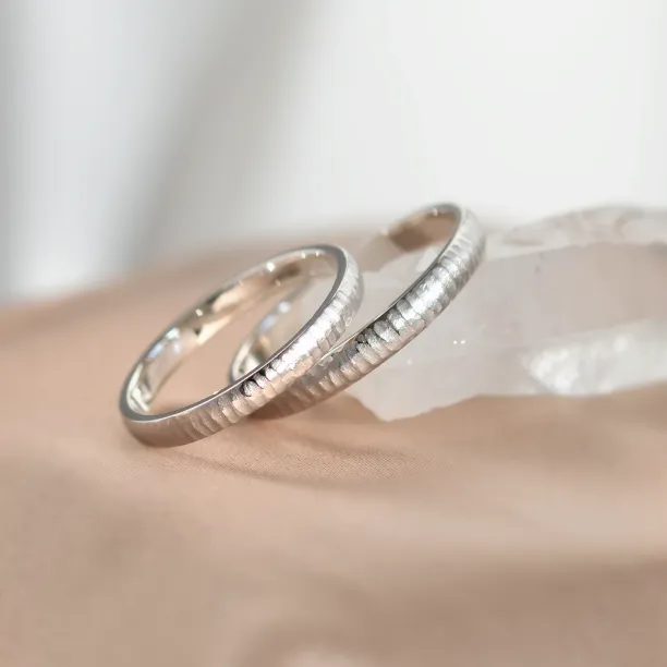 Unusual wedding rings with finely hammered surface LAILA Image