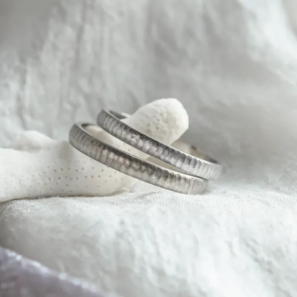Unusual wedding rings with finely hammered surface LAILA Image