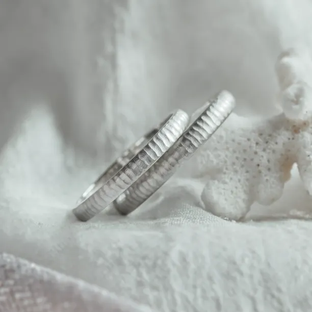 Unusual wedding rings with finely hammered surface LAILA Image