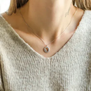 Gold necklace with unusual surface and baby foot trace LEE