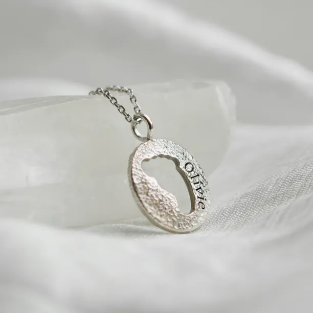 Gold necklace with unusual surface and baby foot trace LEE Image