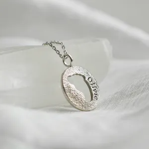 Gold necklace with unusual surface and baby foot trace LEE Thumbnail