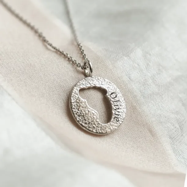 Gold necklace with unusual surface and baby foot trace LEE Image