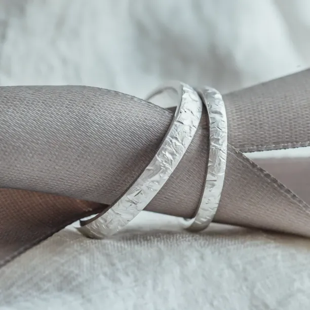 Matte wedding rings with unusual surface AIDA Image