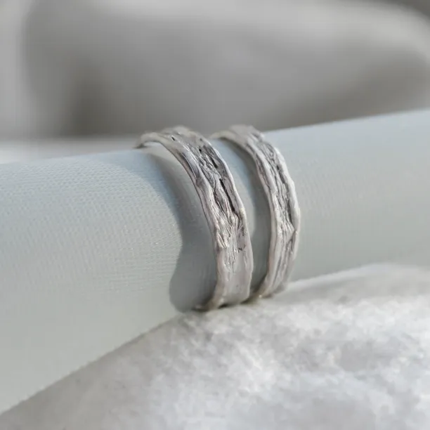 Unusual wedding rings with natural surface ARETA Image
