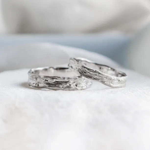 Unusual wedding rings with natural surface ARETA Image