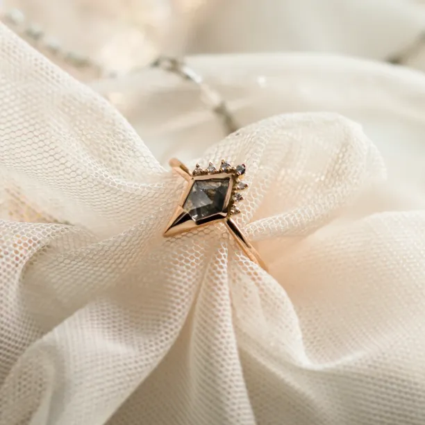 Unusual engagement ring with salt and pepper diamond and side diamonds ADIRA Image