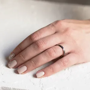 Black hammered wedding bands in organic shape GOLEM