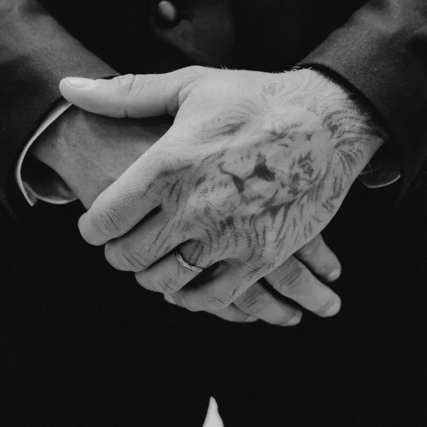 Black hammered wedding bands in organic shape GOLEM Image