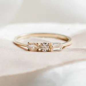 Gold ring with three moissanites AVERY