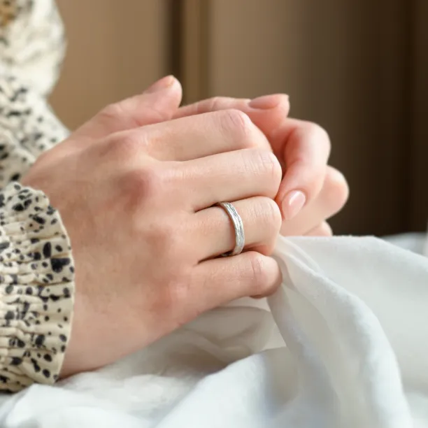 Unusual wedding rings with natural surface ARETA Image