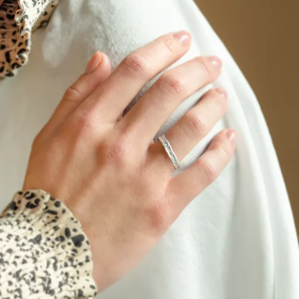 Unusual wedding rings with natural surface ARETA Image