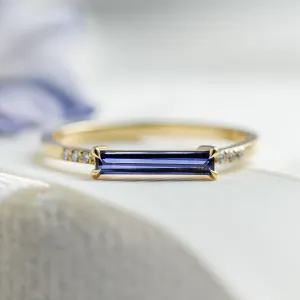 Gold ring with blue lab grown sapphire and diamonds IRIS