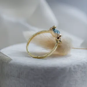 Gold ring with blue raw diamond and hammered surface SEA Thumbnail