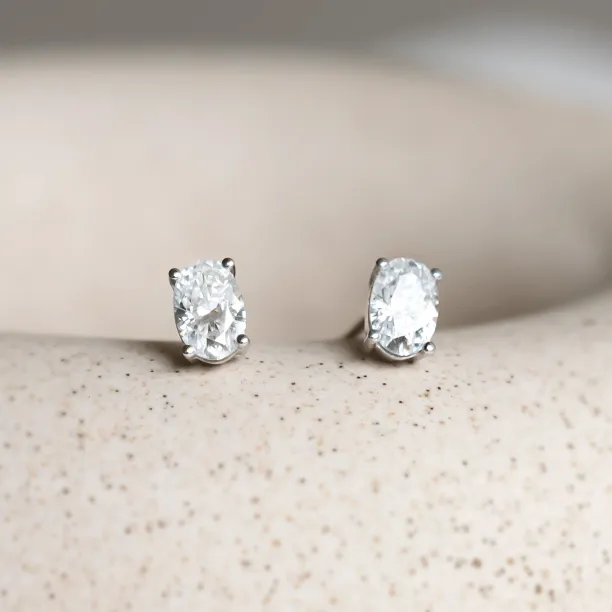 Gold minimalist earrings with oval moissanites CAROLYNE Image