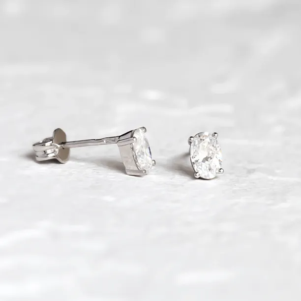 Gold minimalist earrings with oval moissanites CAROLYNE Image