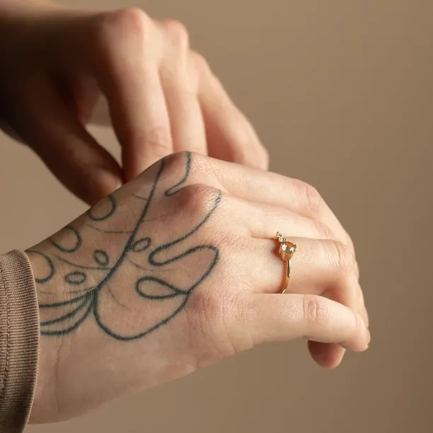 Gold ring with rutilated quartz and diamonds QUIDO Image