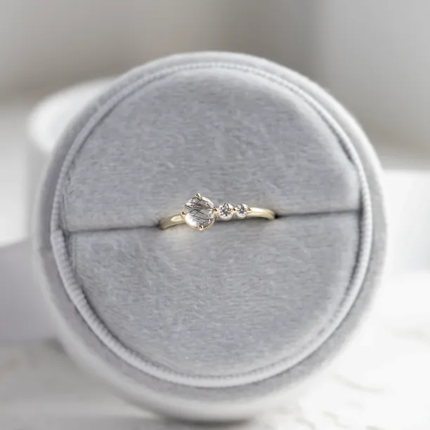 Gold ring with rutilated quartz and diamonds QUIDO Image