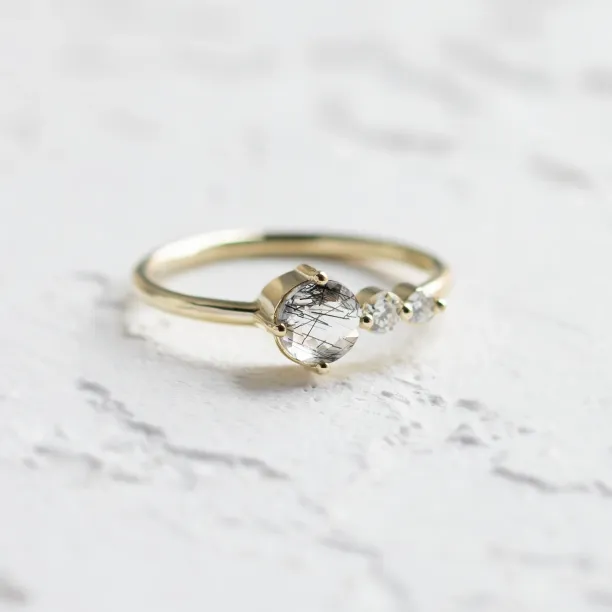 Gold ring with rutilated quartz and diamonds QUIDO Image