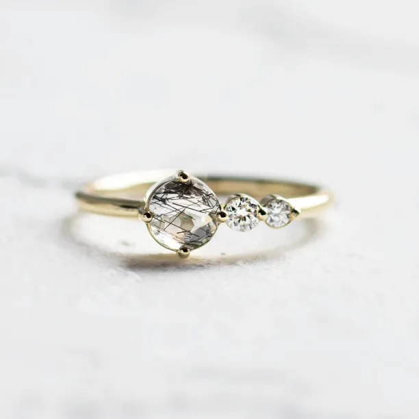 Gold ring with rutilated quartz and diamonds QUIDO Image