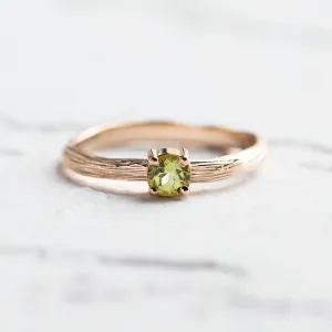 Gold ring in tree bark shape with peridot OLIVE