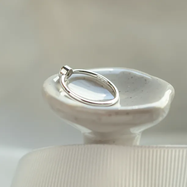 Minimalist engagement ring with salt and pepper diamond AINE Image