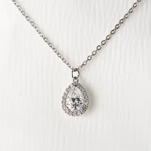 Gold halo pendant with moissanites GLORY