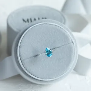 Zlatý prsten s modrým topazem OLLY Thumbnail