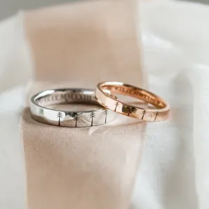 Gold wedding rings with engraved trees FORI