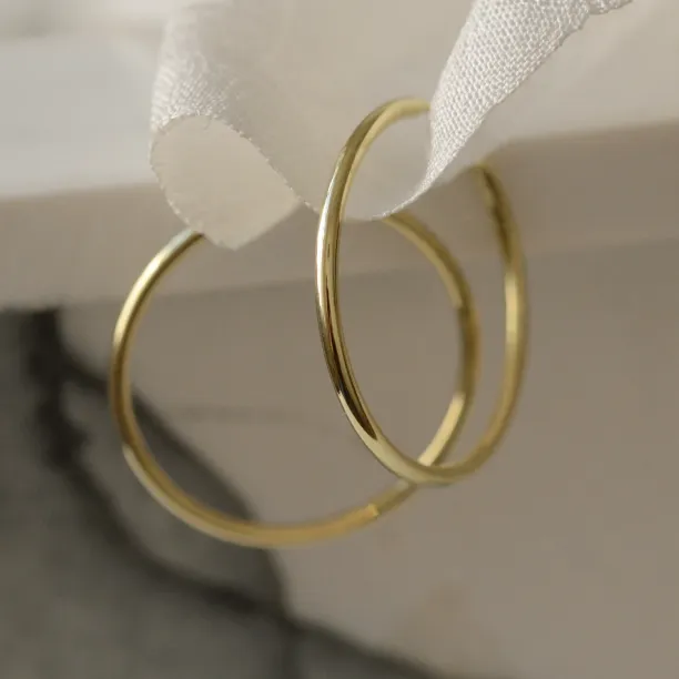 Gold hoop earrings MOZZA Image