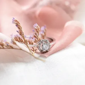 A platinum ring with halo stones and diamonds HALOY Thumbnail