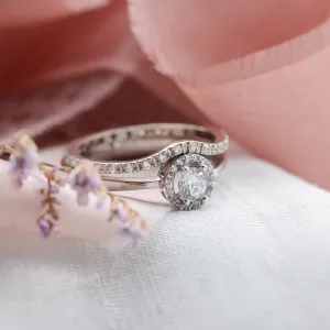 A platinum ring with halo stones and diamonds HALOY Thumbnail