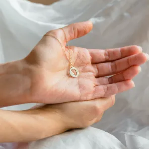 EIIA gold diamond pendant with baby foot trace Thumbnail