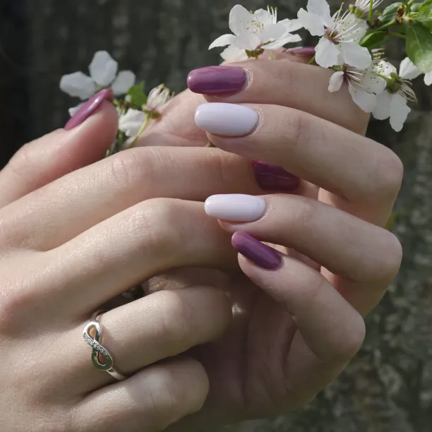 Zlatý prsten ve tvaru nekonečna s diamanty SALVIN Image