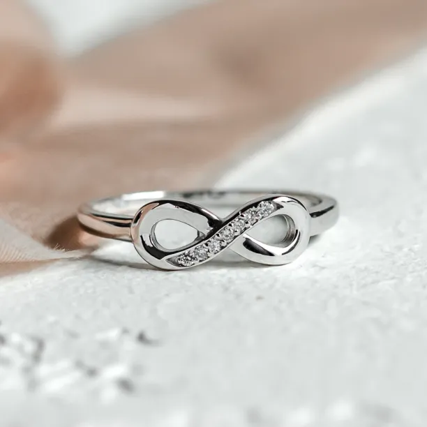 Zlatý prsten ve tvaru nekonečna s diamanty SALVIN Image