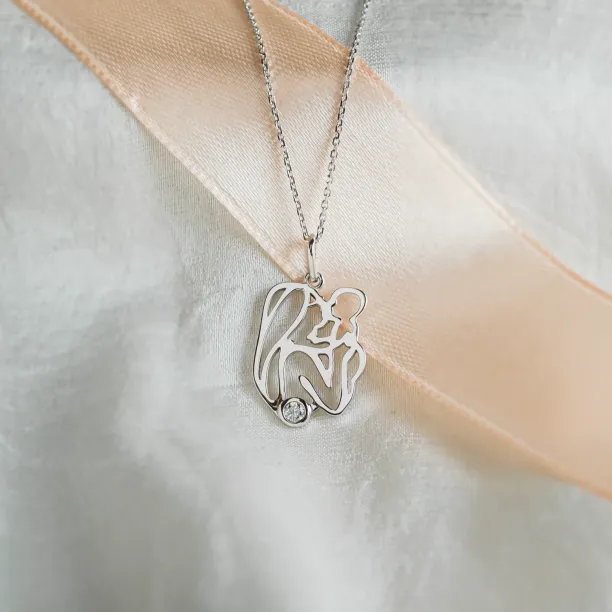 Jedinečný přívěsek ze zlata a diamantem s vyobrazením matky a dítěte MOMMY Image